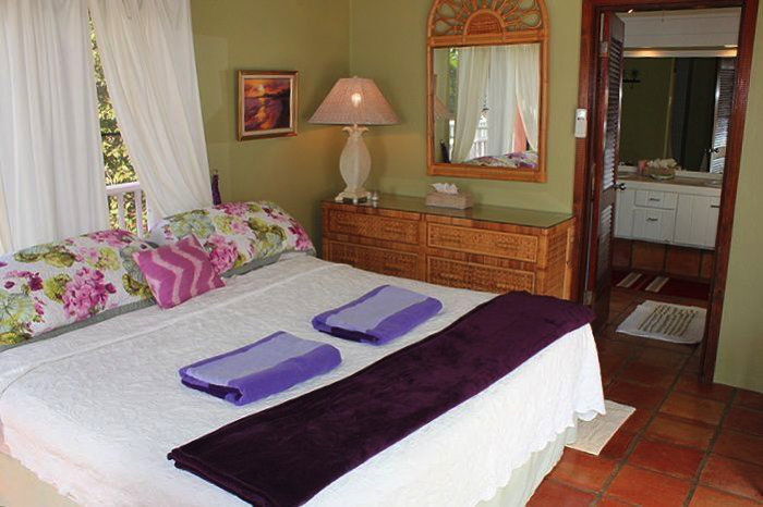 The master bedroom features an en suite bathroom with dual vanities